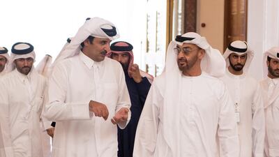 Sheikh Mohammed bin Zayed, Crown Prince of Abu Dhabi Deputy Supreme Commander of the Armed Forces, bids farewell to Sheikh Tamim bin Hamad Al Thani, Emir of Qatar, at the Presidential Airport. Hamad Al Kaabi / Crown Prince Court - Abu Dhabi