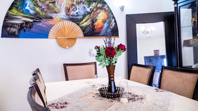 The Rowberry family hang souvenirs from different countries they have visited around the house.