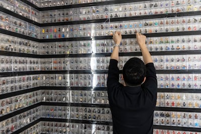 Chang has neatly assembled his collection into a clean display that adorns the walls of his home office. Antonie Robertson / The National