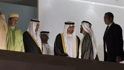 Sheikh Hamad bin Mohammed, Ruler of Fujairah (3rd L), Sheikh Mohammed bin Zayed, Crown Prince of Abu Dhabi and Deputy Supreme Commander of the Armed Forces (C), and Sheikh Mohammed bin Rashid, Vice President, and Ruler of Dubai (2nd R), attend the 44th UAE National Day celebrations at Zayed Sports City, Philip Cheung / Crown Prince Court - Abu Dhabi