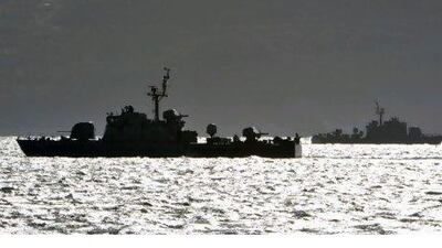 South Korean ships patrol near Yeonpyeong island yesterday. Pyongyang has warned Seoul of further strikes in case of "provocations".