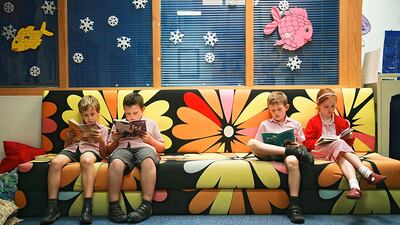 Students reading in the bright and colourful school library. Lee Hoagland / The National