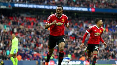 Anthony Martial of Manchester United celebrates scoring his side's second goal during the FA Cup semi-final against Everton in London on Saturday. Paul Gilham / Getty Images