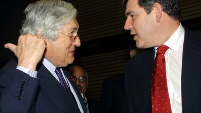 Wolfensohn speaks to former UK chancellor Gordon Brown in April 2001 during the annual spring meetings of the World Bank and the International Monetary Fund in Washington. Getty Images