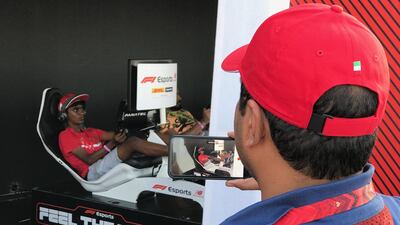 Yashish Manohar taking part in the E-sports challenge at Yas Marina Circuit. Charles Capel / The National