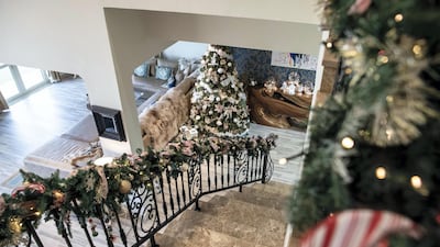 Festive garlands run along the banister in the Watson's five-bedroom villa