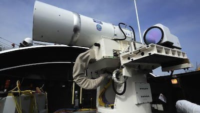The Laser Weapon System (LaWS) temporarily installed aboard the guided-missile destroyer USS Dewey (DDG 105) in San Diego, California.
