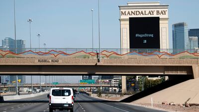 President Donald Trump's motorcade passes the Mandalay Bay Resort and Casino on the way to meet with victims and first responders of the mass shooting. Evan Vucci / AP Photo