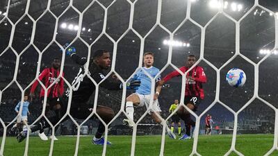 Lazio's Ciro Immobile scores their first goal. Reuters