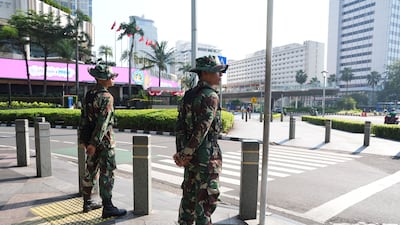 Members of the Indonesian army stand guard in front of Hotel Indonesia Kempinski following protests in Jakarta, Indonesia, on September 1, 2025. Bloomberg