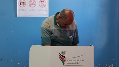 A Jordanian man casts his ballot in Amman, as citizens go to the polls for parliamentary elections. Getty Images