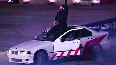 A member of the US Police Academy performs during a drift event at the Riyadh Motor Show at Al-Janadriyah village in the Saudi capital. AFP