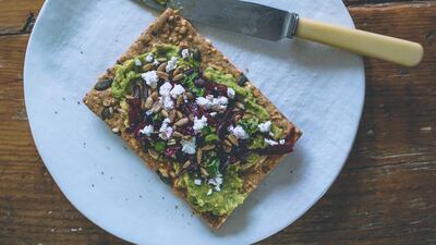 Sunflower seed crackers with avocado, beetroot and feta. Photo: Scott Price