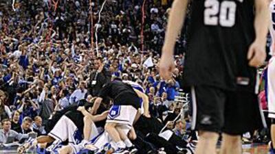 Duke players celebrate after winning the final.