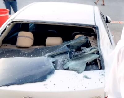Footage from Emirati journalist Mundher Al Shamsi of the car that a one-year-girl landed on after falling from the tenth floor of a building.