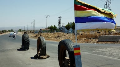 A Druze flag flutters on a road in Sweida. Reuters