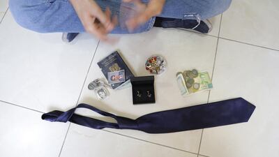 29 years old Syrian refugee Nacir shows the objects he brought with him from home in Syria, at the UNHCR (UN Refugee Agency) and Johud (Jordanian Hashemite Fund for Humanitarian Development) run, Nuzha Community Support Center for refugees in Amman, Jordan. Nacir is originally from Damascus, Syria, he left in 2012 to flee raising violence for what he thought was a temporary time but has not returned since then. In Syria he was in a tourism hospitality school and was proudly ranked second in the whole country securing a job with a famous hotel chain in Damascus. EPA