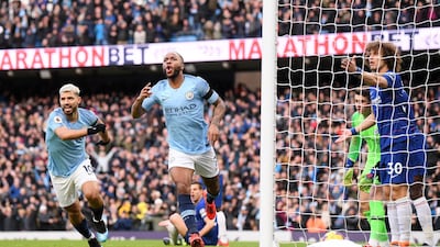 Raheem Sterling, centre, opened the scoring for City. Getty.