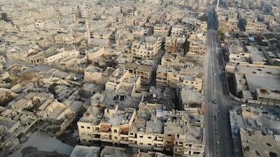 A drone picture shows empty streets and damaged buildings in the town of Maaret Al-Numan in the northwestern Idlib province. AFP
