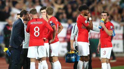 England manager Gareth Southgate (left) speaks to the players as the Euro 2020 Qualifying match against Bulgaria is temporarily halted following racist chanting from fans. PA