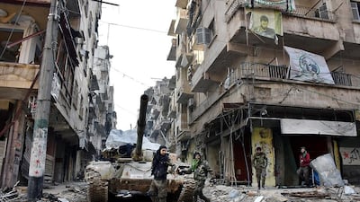 Syrian soldiers in Aleppo on December 23, 2016, a day after the military declared victory in the northern city following the departure of all opposition fighters from the former rebel stronghold in east Aleppo. Sana / EPA