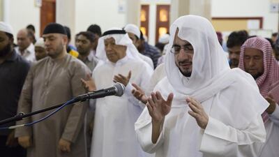 Worshippers pray at Dubai’s Jumeirah mosque. Thousands of Muslims went to mosques to hear the first morning prayers of the holy month at 4.30am. Duncan Chard for The National