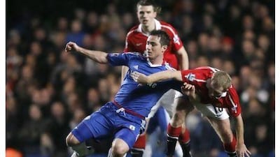 Chelsea's Frank Lampard, left, scored the winner from a penalty against United on Tuesday. Matt Dunham / AP Photo