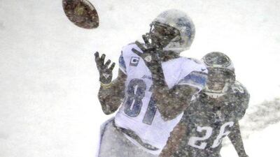 Detroit wide receiver Calvin Johnson makes a catch in Philadelphia. Matt Rourke / AP