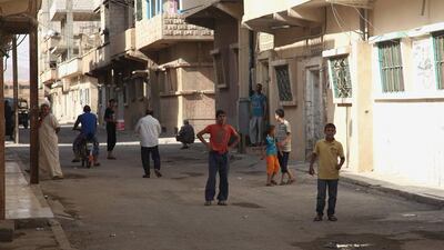 Though surrounded by desert dunes, Palmyra developed into a luxurious metropolis thanks to the trade of spices, perfumes, silk and ivory from the east, and statues and glasswork from Phoenicia. Photo from May 19, 2015 shows residents walking in the city. Reuters