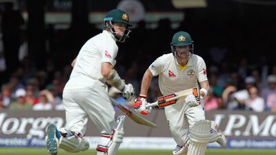 Australia’s Steven Smith (R) and Australia’s Chris Rogers run between the wickets during play on the first day of the second Ashes cricket test match between England and Australia at Lord's cricket ground in London, on July 16, 2015. Ian Kington / AFP