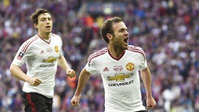 Juan Mata, right, scored the equalising goal for Manchester United in the FA Cup final, but there is a chance he could be marginalised once Jose Mourinho is appointed the club's manager. Toby Melville / Reuters