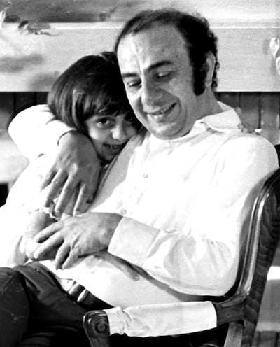 Composer Assi Rahbani with his youngest daughter, Rima, at their home in Rabieh in the 1970s. AFP