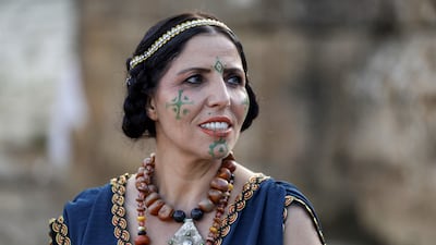 An actress in a performance retracing the history of civilisations that occupied the archaeological site of Chellah, at the site in Morocco's capital Rabat. AFP