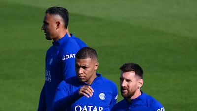 Lionel Messi and Kylian Mbappe during training on Tuesday. AFP