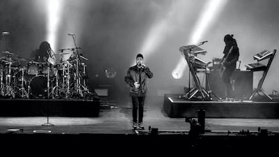 With a black-clad three peace band – a drummer, keyboardist and guitarist – huddled in tight formation behind the singer (who also resembled a monochrome figure with a black jacket and jeans and baseball cap), most of the drama occurs in the large screen behind with its constant mix of atmospheric images. Courtesy Sife El Amine