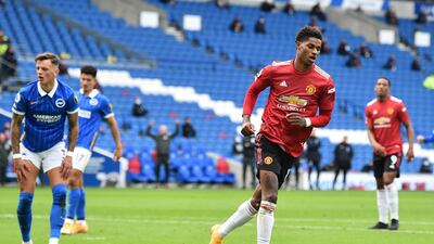 Manchester United's Marcus Rashford celebrates after scoring against Brighton and Hove Albion at the American Express Community Stadium on Saturday. AFP