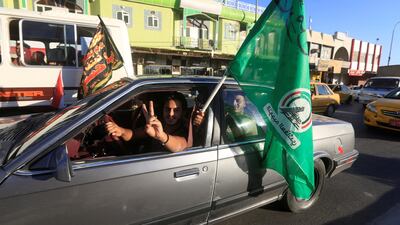 Kirkuk residents celebrate its capture by Iraqi forces on October 17, 2017. Alaa Al Marjani / Reuters
