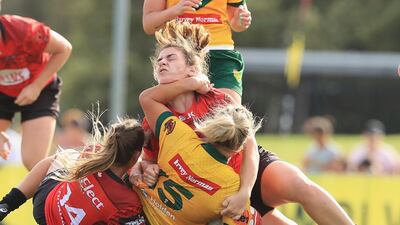 Ruan Sims of Australia is tackled during the 2017 Rugby League World Cup Semi Final match between Australia and Canada at Southern Cross Group Stadium. Mark Evans / Getty Images