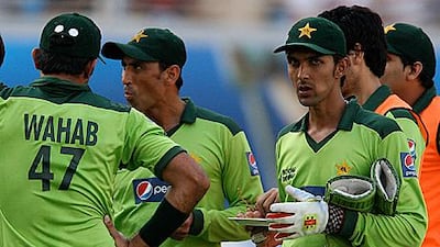 Zulqarnain Haider, right, eyes the camera during a drinks break in the third one-day match against South Africa in Dubai.