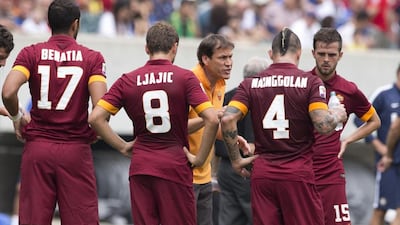 Rudi Garcia, centre, and his Roma team did a good job at the start of the last season. Getty Images
