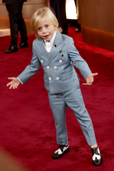 Duke McCloud scores points with the internet after making the viral 6-7 hand gesture on the red carpet. EPA