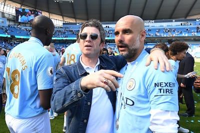 Noel Gallagher, left and City manager Pep Guardiola. Getty Images