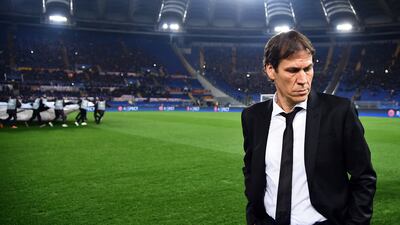 Roma's coach from Rudi Garcia walks off the pitch before the Champions League match against Bate Borisov on December 9, 2015 at the Olympic Stadium in Rome. AFP
