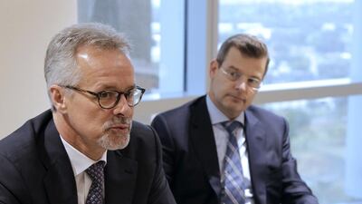 Eduardo Leemann, Falcon Private Bank’s chief executive, left, and Erich Pfister, the global head of Falcon’s private banking, discuss their decision to set up an address at the DIFC. Jeffrey E Biteng / The National