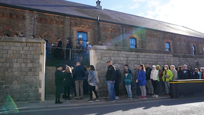People queue to visit the queen’s final resting place. PA