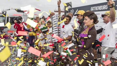 The Abu Dhabi Ocean Racing team celebrate with the in-port trophy after winning the Volvo Ocean Race's accompanying short-format race series on Saturday.