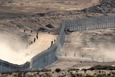 Israeli troops cross into Gaza during clashes with Hamas in November 2023. AFP