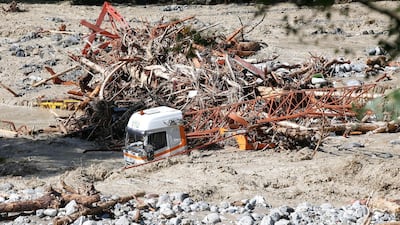 A lorry is submerged by mud after flooding of the Vesubie river because of heavy rain in the south-eastern French town of Roquebilliere. EPA