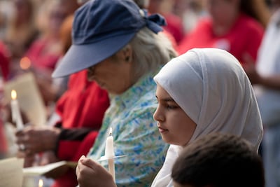 An inter-faith remembrance vigil at the Henry Ford Museum in Dearborn, Michigan. Alamy