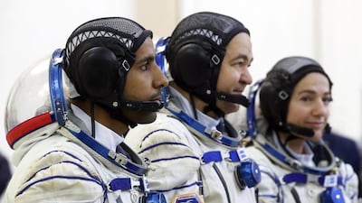Al Mansouri, Skripochka and NASA astronaut Jessica Meir attend their final exams. EPA